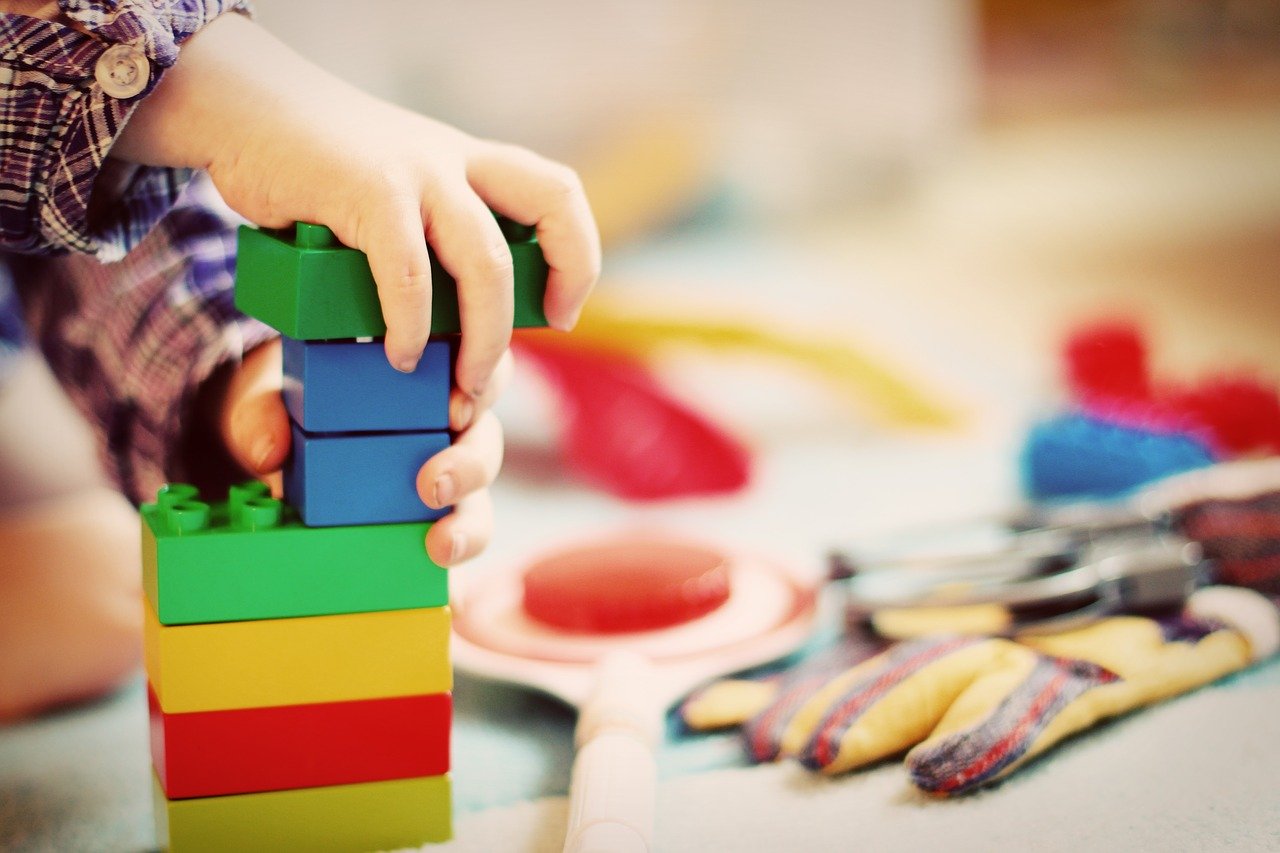 Kid playing with blocks generic